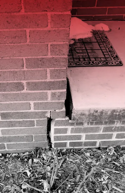 cracks in brick, signs of foundation damage