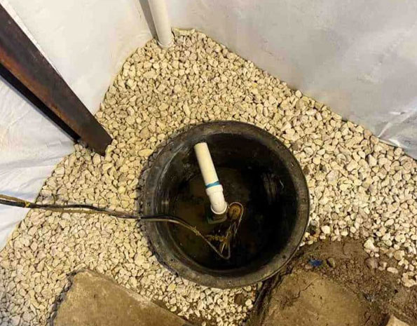sump pump installed in a new sump pump basin